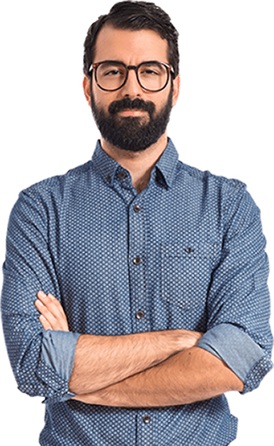A man with beard and glasses standing in front of black background.