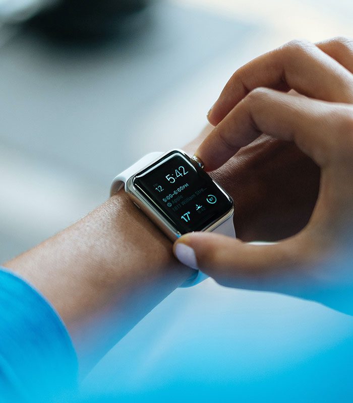 A person is looking at the time on their wrist.