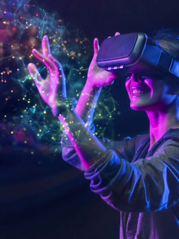 A person wearing a vr headset and holding something up to the sky.